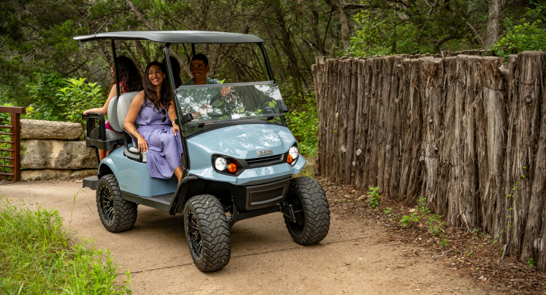 People driving golf carts